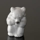 White Polar bear cub sitting timidly figurine, Royal Copenhagen no. 21435 or 235