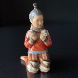 Grønlandsk pige, Overglasur figur, Royal Copenhagen nr. 12415 eller 254