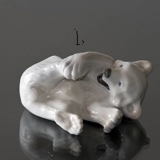 Eisbär spielt mit seinem Fuß, Royal Copenhagen Figur Nr. 729 oder 072