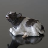 Calf lying down mooing for its mother, Royal Copenhagen figurine no. 1072 or 082