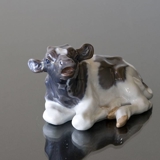 Calf lying down mooing for its mother, Royal Copenhagen figurine no. 1072 or 082