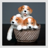 Welpen in einem Korb sehen süß aus, Royal Copenhagen Hund Figur Nr. 745