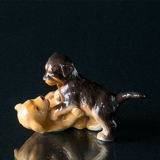 Golden Retriever and rottweiler puppies playing, Royal Copenhagen dog figurine no. 746