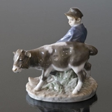 Boy walking to the field with Calf, Royal Copenhagen figurine no. 772 or 074