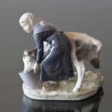 Girl feeding a Calf from a bucket, Royal Copenhagen figurine no. 779 or 075