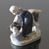 Girl feeding a Calf from a bucket, Royal Copenhagen figurine no. 779 or 075