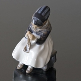 Amager Girl, Sowing while in Regional Costume, Royal Copenhagen figurine no. 1314 or 097