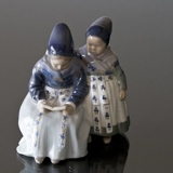 Amager Girls, Reading while in Regional Costume, Royal Copenhagen figurine no. 1395 or 100