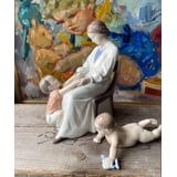 Toddler with sock trying to crawl, Royal Copenhagen figurine no. 1739 or 112