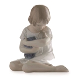 Girl with Doll in her Arms, Royal Copenhagen figurine no. 1938 or 121