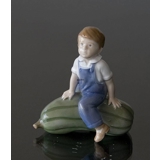 Boy with pumpkin, Royal Copenhagen figurine no. 4539 or 153