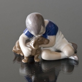 Boy hugging his Friend the Dog, Bing & grondahl figurine no. 1951 or 440