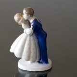 Youthful Boldness, Boy stealing a kiss from Girl, Bing & Grondahl figurine no. 2162 or 447