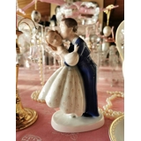 Youthful Boldness, Boy stealing a kiss from Girl, Bing & Grondahl figurine no. 2162 or 447