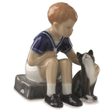 Jens med sin kat Felix, Royal Copenhagen figur nr. 684