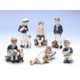 Jens med sin kat Felix, Royal Copenhagen figur nr. 684