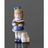 The Children's Christmas 1999, Figurine Ornament, Girl with book, and presents