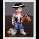 Thomas, Cowboy dreng. Figur i Royal Copenhagens serie af minibørn nr. 011