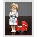 Anna Girl with Doll's Pram, one in a series of minichildren from Royal Copenhagen From the series of mini children from Royal Copenhagen, figurine no. 014