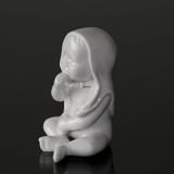 Baby sitting with his blanket on his head, white Royal Copenhagen figurine no. 028