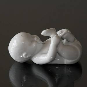 Pludrende baby, hvid Royal Copenhagen figur | Nr. 1249031 | Alt. 1249031 | DPH Trading
