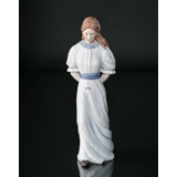 Lady Walking with Hat Behind Her, Royal Copenhagen figurine no. 050 in the series Scandinavian women