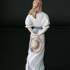 Kvinde med hat, Royal Copenhagen figur i serien af Skandinaviske kvinder | Nr. 1249050 | Alt. 1249050 | DPH Trading