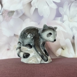 Racoon on Rock looking down, Royal Copenhagen figurine no. 056