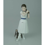 Ballerina standing doing her hair, Royal Copenhagen figurine no. 138