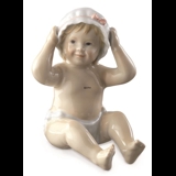 Sitzendes Baby mit einer Badekappe/Haube, Royal Copenhagen Figur Nr. 247