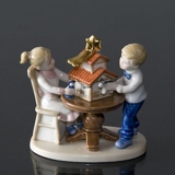 Clara & Peter decorating the nativity scene, Royal Copenhagen figurine no. 294