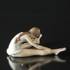 Siddende ballerina som bøjer sig forover, Royal Copenhagen figur | Nr. 1249329 | DPH Trading
