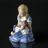 Girl gets a doll, Royal Copenhagen figurine no. 410