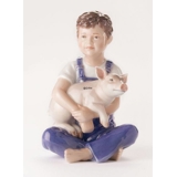 Boy with piglet, Royal Copenhagen figurine no. 436