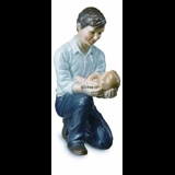 Father with sleeping baby on his knee, Royal Copenhagen figurine no. 542