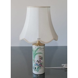 Octagonal lampshade with curves height 30 cm, covered with off white silk fabric