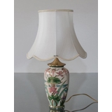 Octagonal lampshade with curves height 26 cm, covered with off white silk fabric