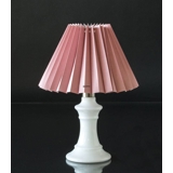 Pleated lamp shade of rose coloured chintz fabric, sidelength 18cm