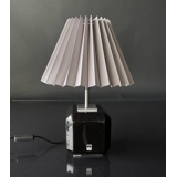 Pleated lamp shade of grey chintz fabric, sidelength 18cm