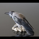 Crow perched on a rock looking inquisitive, Bing & Grondahl bird figurine No. 1714
