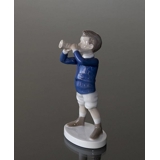 Boy blowing his trumpet, Bing & Grondahl figurine No. 1792