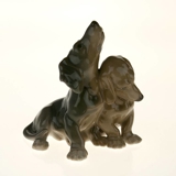Pair of dachshunds standing in friendship, Bing & Grondahl dog figurine no. 1805