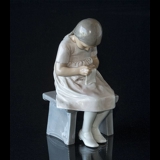 Girl, sitting, Bing & Grondahl figurine no. 1879