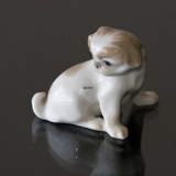 Pekinese sitting looking at its tail, 5,5cm, Bing & Grondahl dog figurine No. 1987
