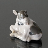Calf lying down licking its back, Bing & Grondahl figurine no. 448 or 2168