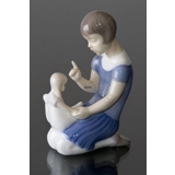 Girl scolding a naughty doll, Bing & Grondahl figurine no. 2191