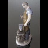 Blacksmith working the anvil, Bing & Grondahl figurine no. 2225