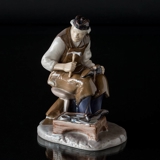 Shoemaker mending the shoes, Bing & Grondahl working man figurine No. 2228