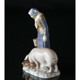 Woman with pig, Bing & Grondahl figurine no. 2237