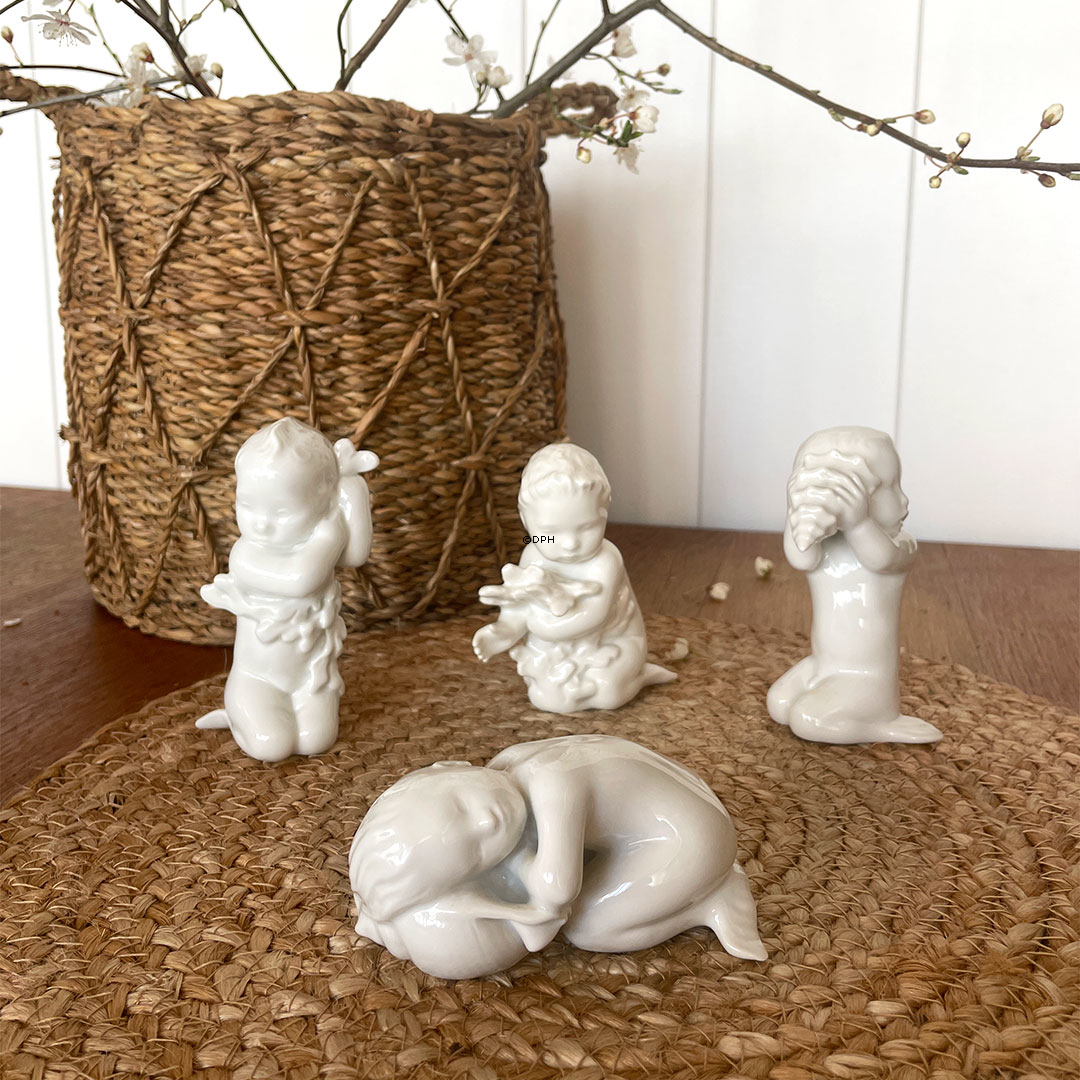 Havdreng med Konkylie, (serien havbørn), Bing & Grøndahl figur nr. 469 eller 2264